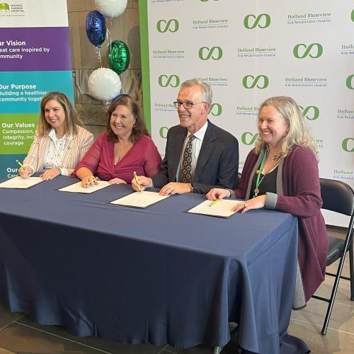 From left: Melanie Kohn, President and CEO of MGH; Terri Hewitt, CEO of Surrey Place; Tom McHugh, CEO of Grandview Kids; and Julia Hanigsberg, President and CEO of Holland Bloorview Kids Rehabilitation Hospital at the launch of the Extensive Needs Partnership in October 2023. 
