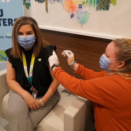 Melanie Kohn receives her vaccine at MGH in fall 2023.