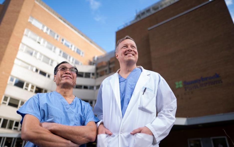 Orthopaedic surgical leads Dr. Paul Wong (Michael Garron Hospital) and Dr. Markku Nousiainien (Sunnybrook) gather outside the Holland Centre. 